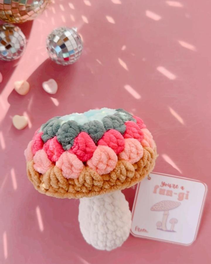 Plush chunky granny mushroom valentines crochet pattern in beige pink coral and teal from @stitchsisterco highlighting funky crochet pattern ideas playful and tactile design