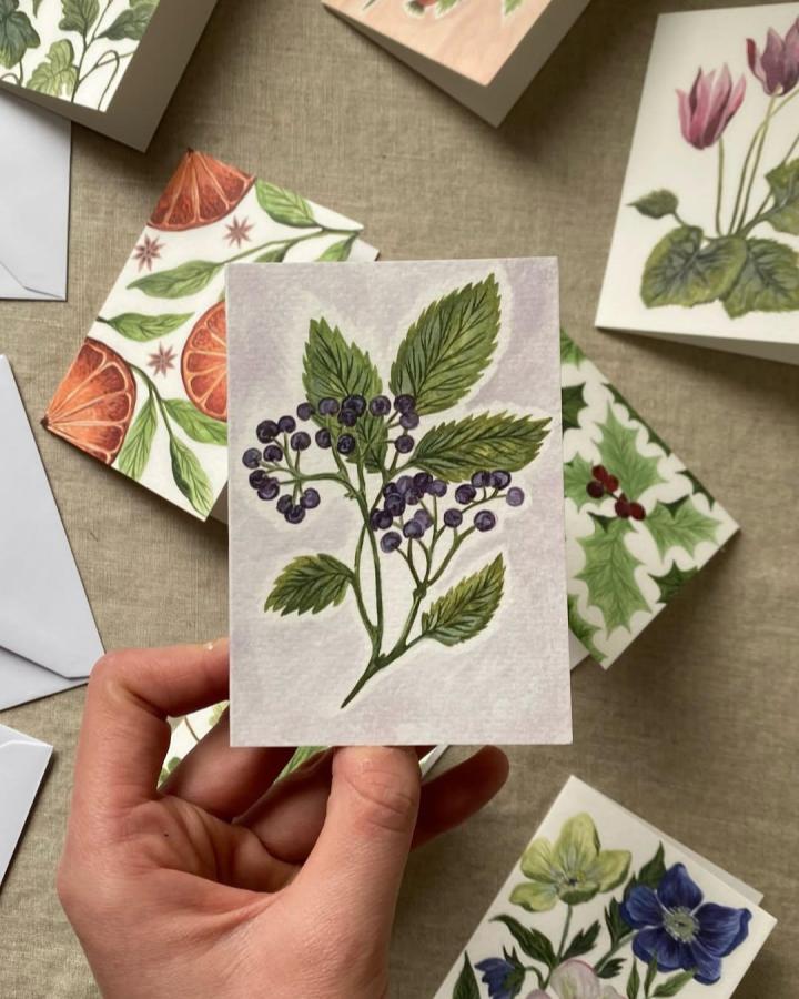 Purple berry branch watercolor card in natural light by @ellemorse_uk showcasing delicate painting crafts for adults with botanical themes.