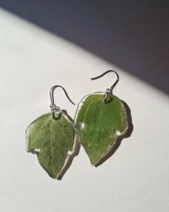 Green leaf resin earrings by @vicky.createsstuff. Clear protective coating highlights natural leaf texture and veins beautifully.