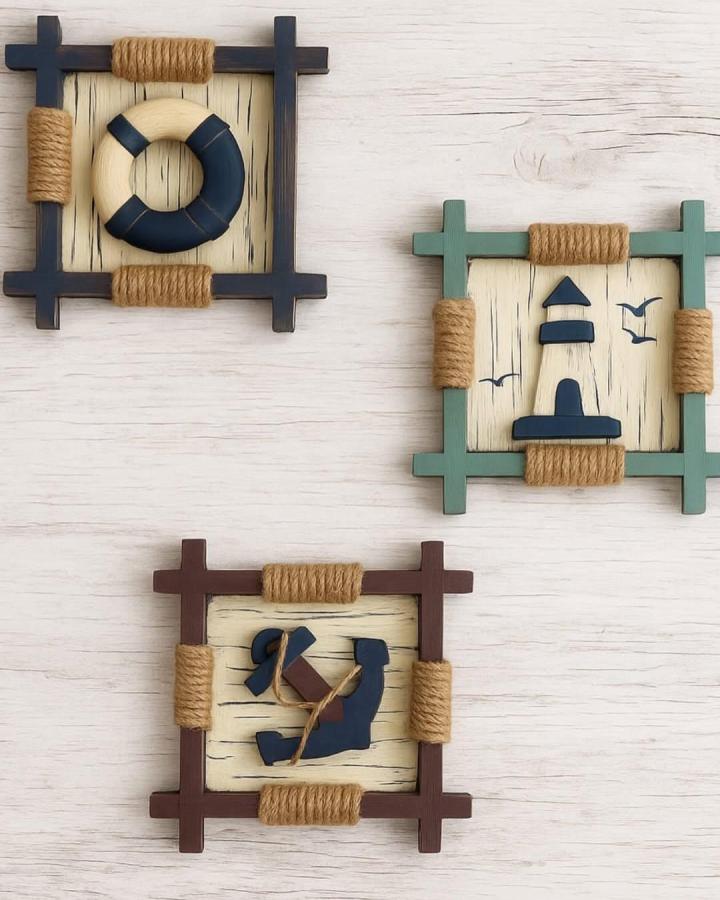 Natural jute rope accented nautical wall art with navy and earthy wood frames from @latienda.decor creating cozy coastal charm.