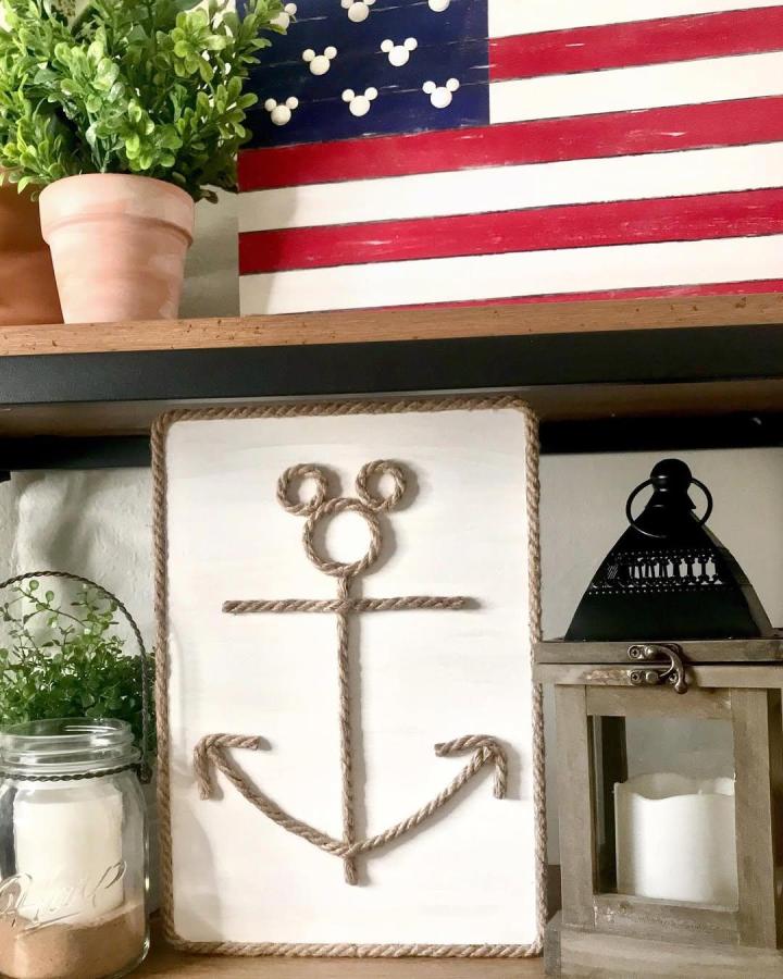 Natural jute rope nautical anchor wall art on whitewashed wood from @myjoystory2 with rustic coastal farmhouse style.