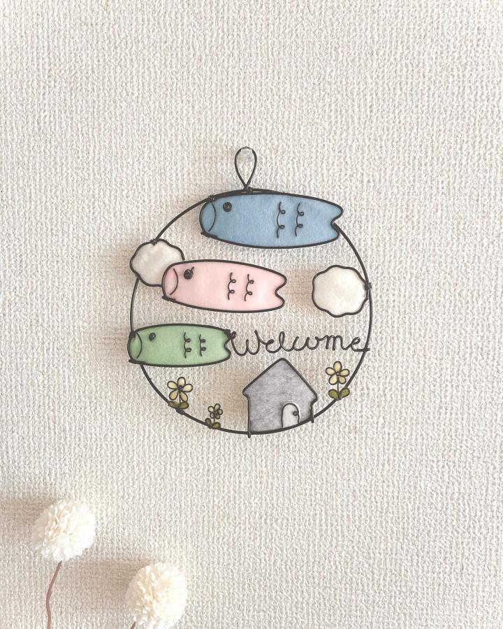 Pastel wire wall art ideas with fish, clouds, and house from @__craft.m showcasing playful home decor charm.