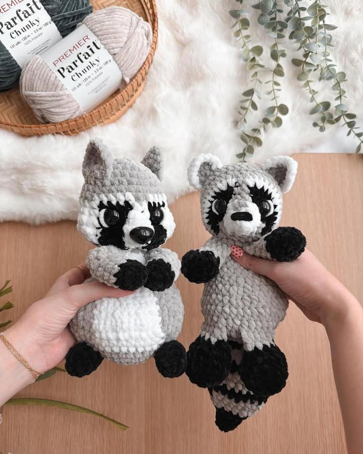 Chunky grey and black plush raccoon amigurumi by @crochetwithkyra perfect for forest animal inspired handmade toys and soft decor.