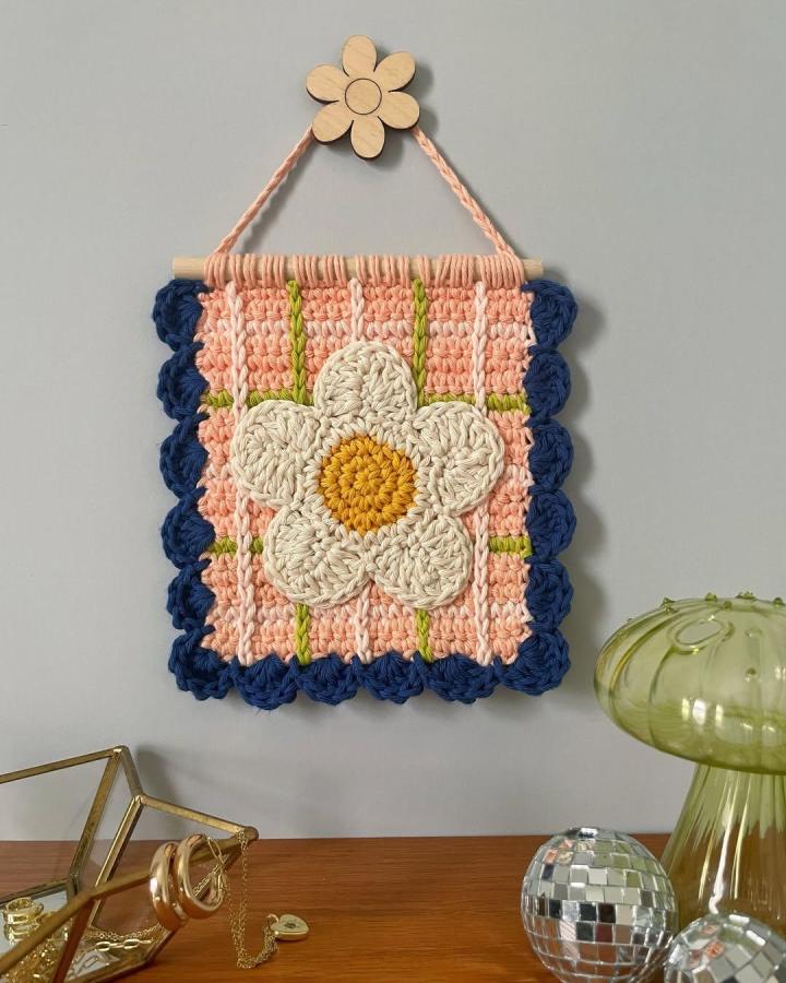 Peach plaid crochet wall hanging with cream flower and navy scalloped edge by @love.indy_ handcrafted colorful fiber art piece.