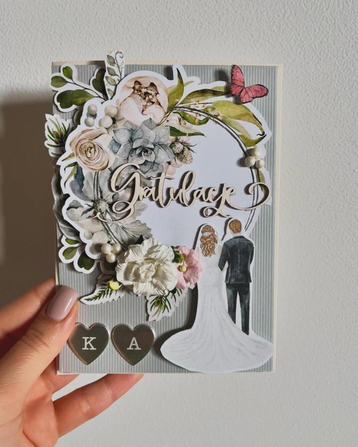 Muted floral layered wedding card with bride and groom silhouettes from @scrapcards_by_tina. Soft pastels and textured paper detail.