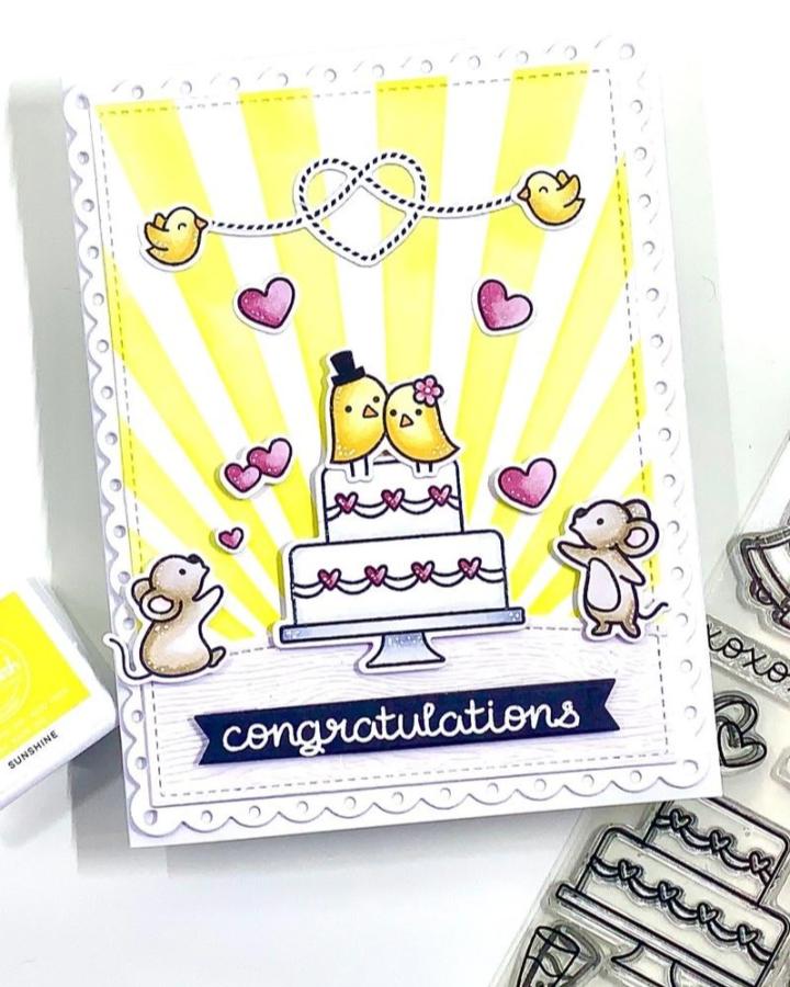 Yellow and white sunbeam background diy wedding card ideas featuring hand-drawn wedding cake with animal toppers by @handmadecards_by_jarle playful and charming design.