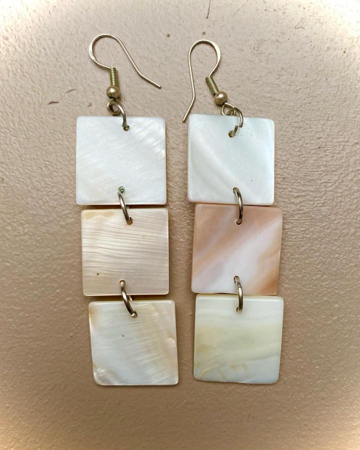 Pearl and peach toned layered shell tile earrings from @sarahsparkles67 featuring delicate natural hues and linked metal rings.