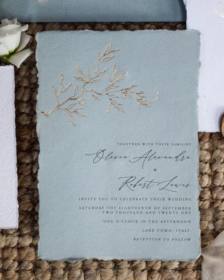 Blue handmade wedding invitations ideas card from @paigenco. Gold botanical embroidery and deckled edges.