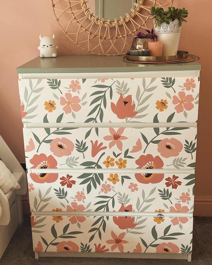 Sage green floral wallpaper Malm dresser from @4ourhouseonthehill. Coral and peach blooms cover each drawer.