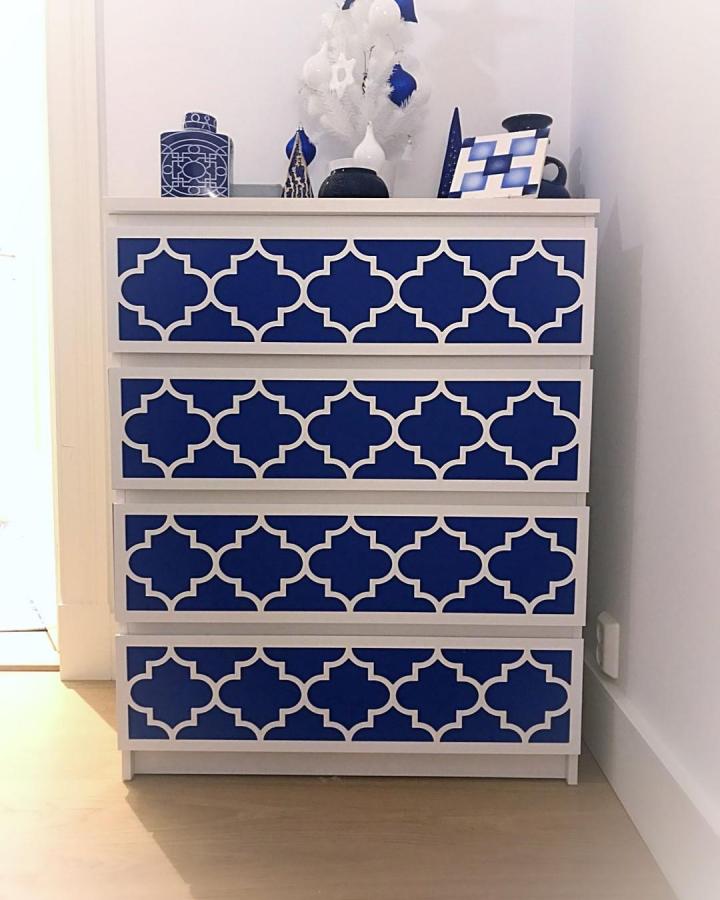 Blue geometric overlay MALM dresser from @myoverlays. White-framed drawers feature repeating quatrefoil panels.