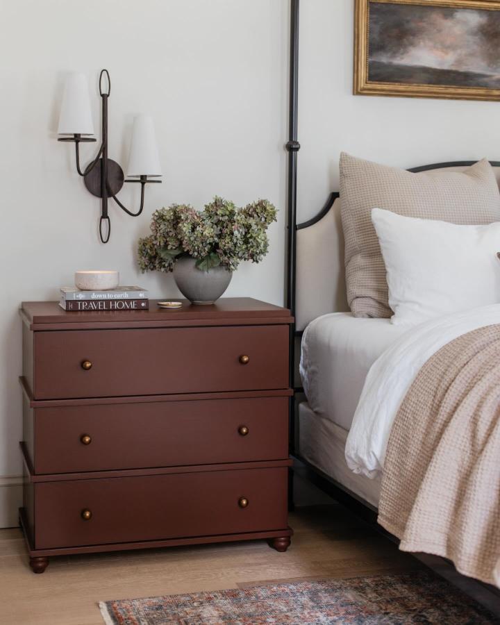 Warm brown three-drawer dresser from @jennasuedesign. Refined ikea malm hacks with trim and bun feet.