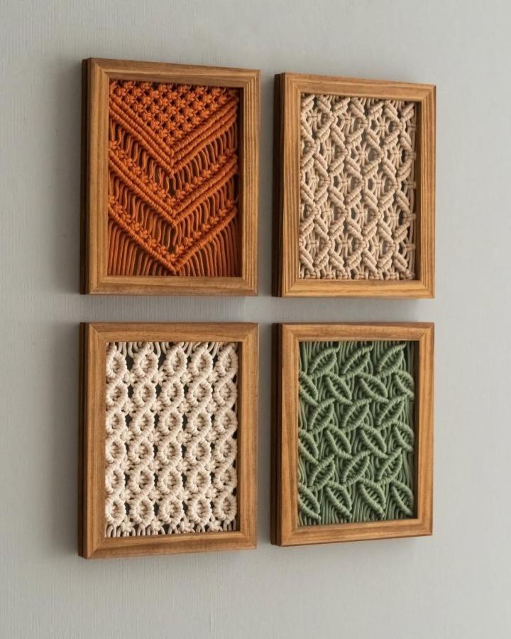 Terracotta, cream, and sage framed wall art from @heartcraftedvn_macrame. These macrame decor ideas feature warm wood frames and knotted texture.