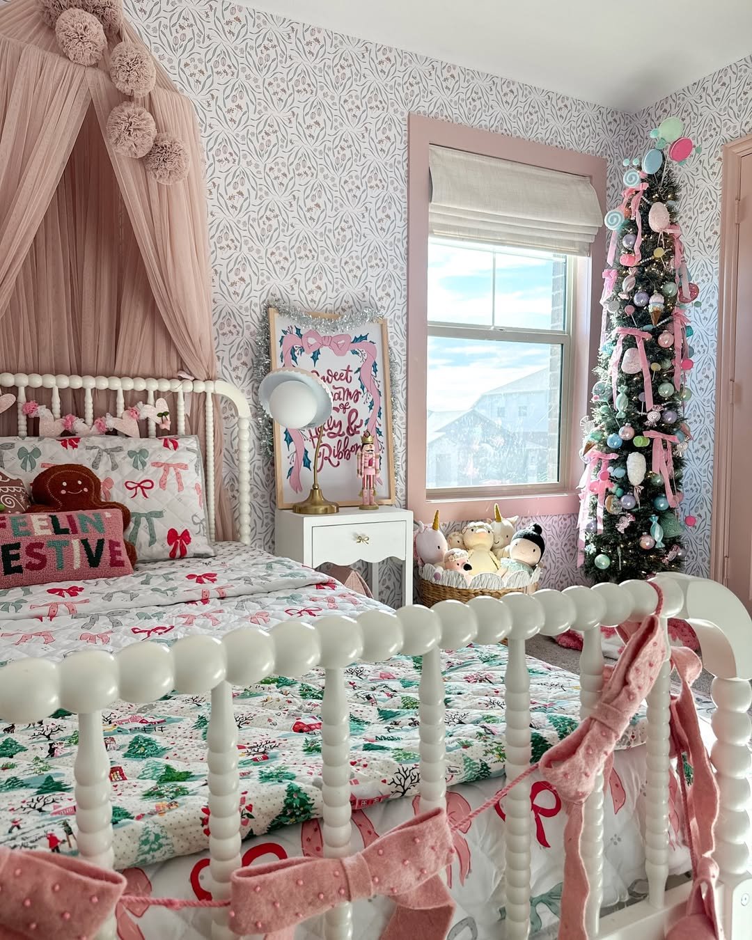 Pastel Christmas tree and festive bedding among cheerful christmas bedroom decor ideas
