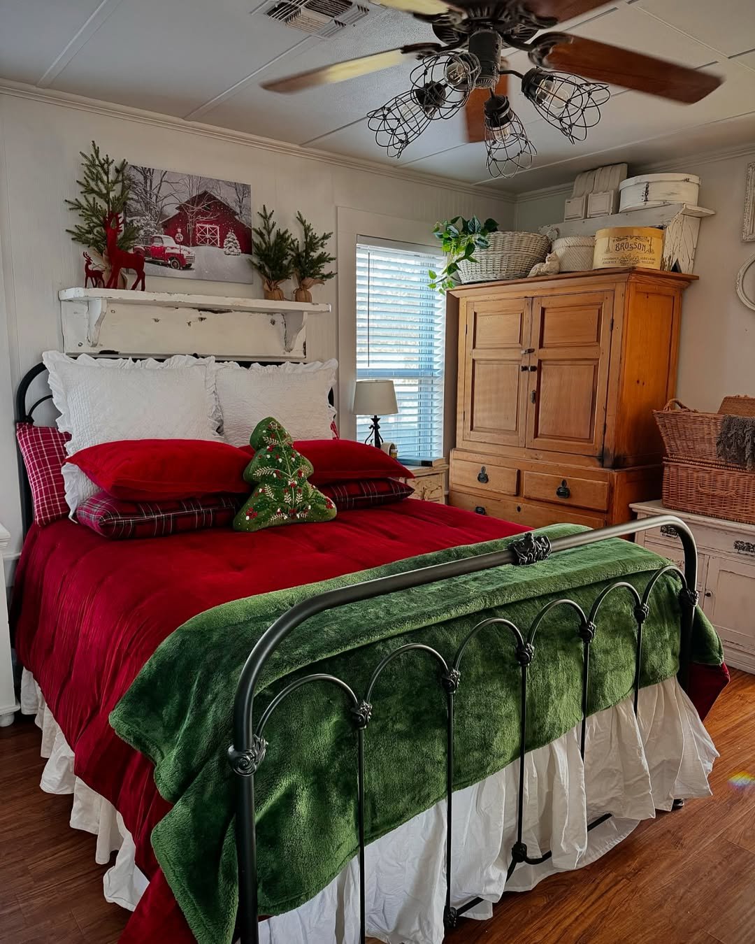 Red and green holiday bedding with rustic Christmas bedroom accents