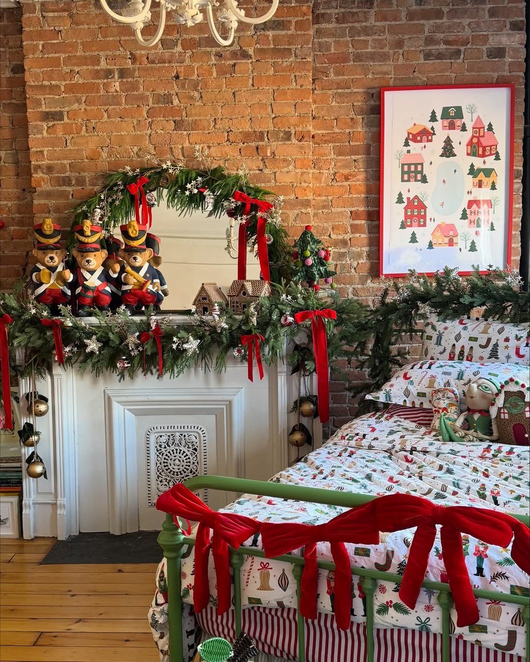 christmas bedroom decor ideas with evergreen garland, red ribbons, nutcrackers, and festive patterned bedding