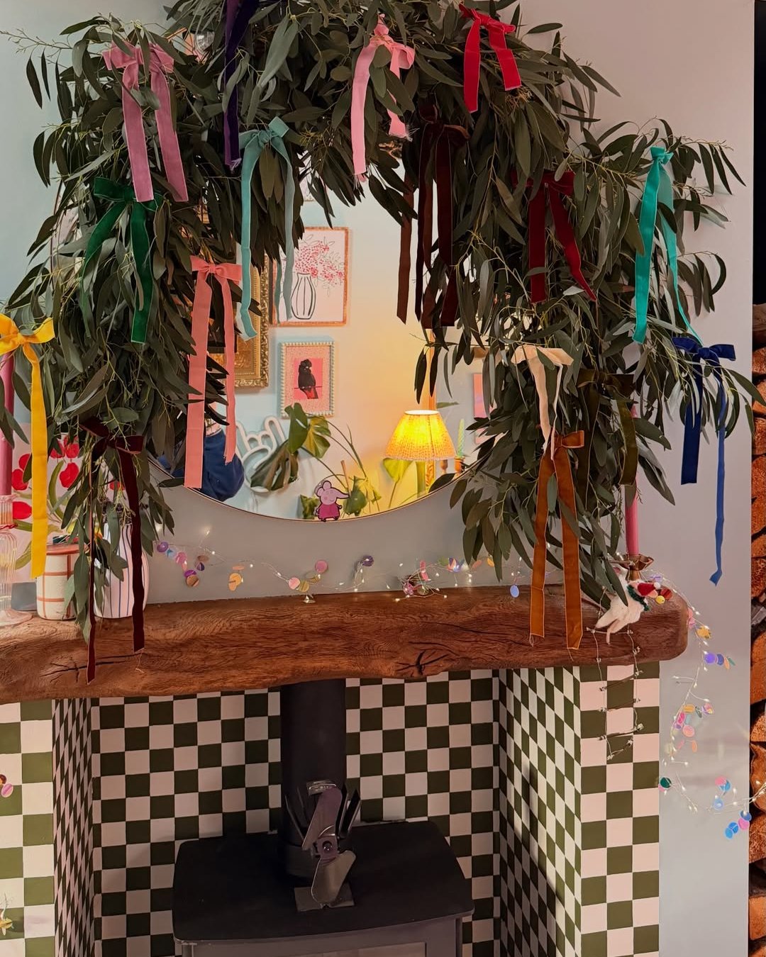 Eucalyptus mantel greenery with colorful ribbon bows for festive decorating
