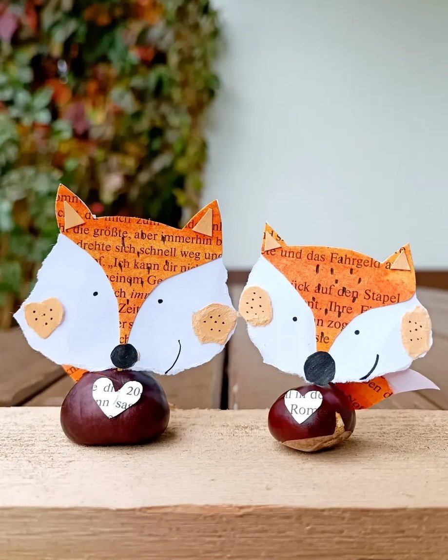 Newspaper foxes with chestnut bodies for fall crafts for kids