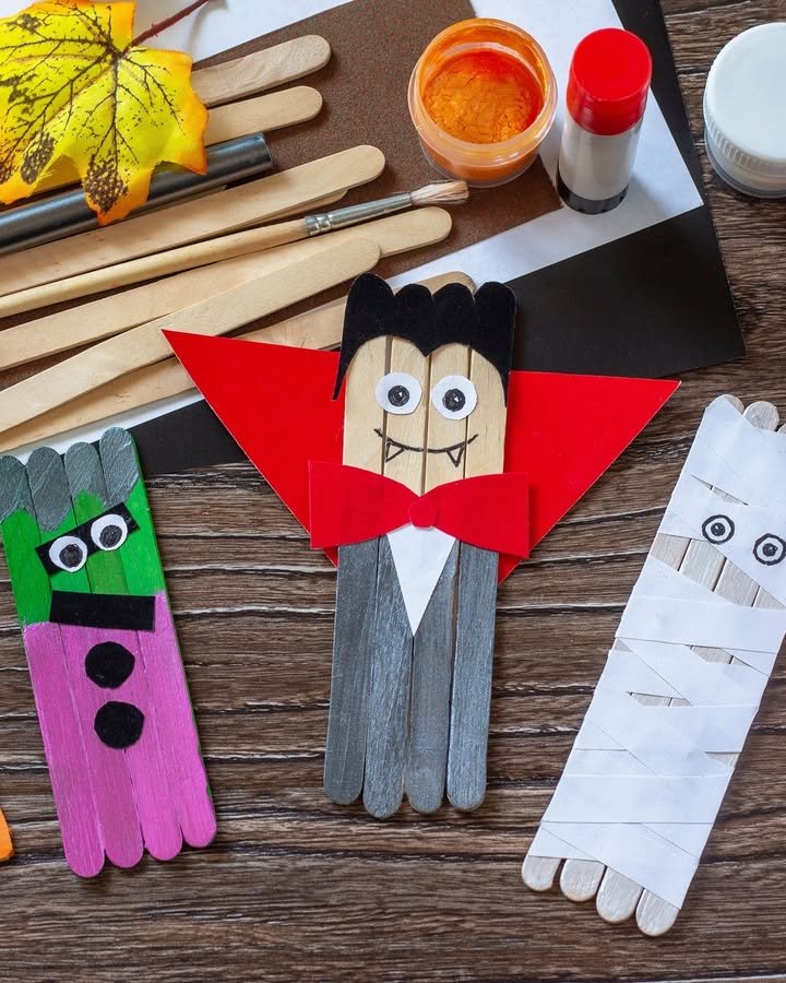 Colorful wooden stick vampire, monster, and mummy crafts for spooky kids' activities
