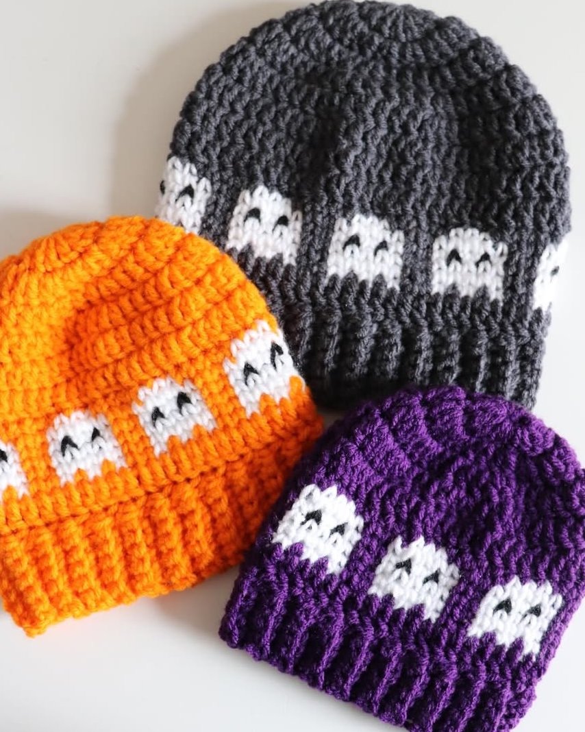 Ghost crochet beanies in orange, purple, and charcoal for festive handmade autumn accessories