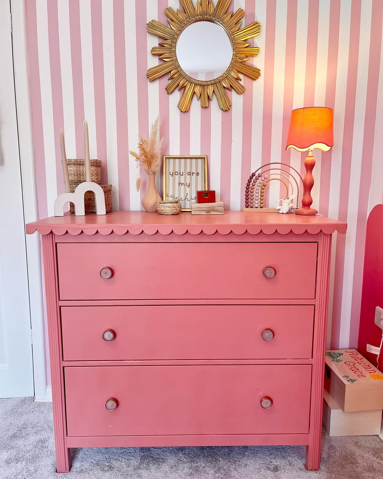 Pink Hemnes dresser makeover with scalloped trim and painted finish