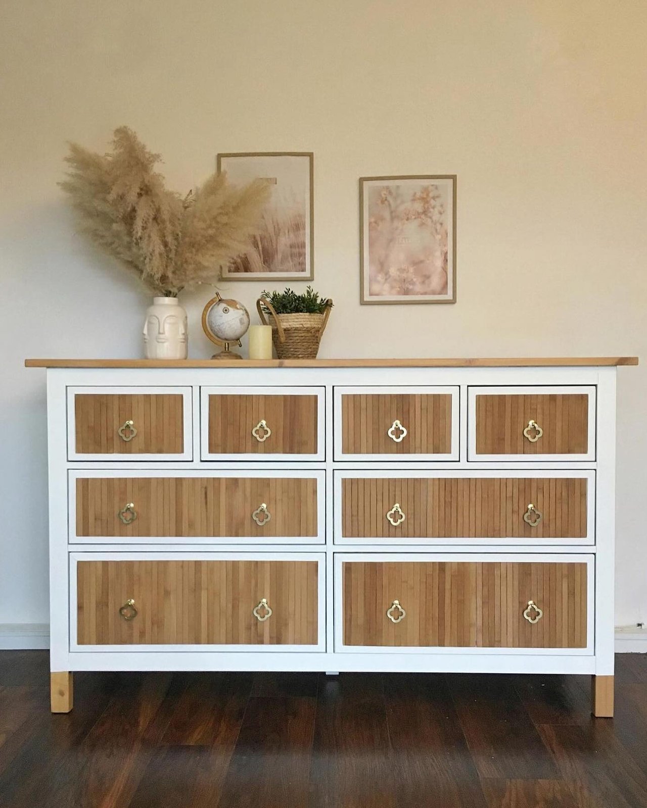 White Hemnes dresser with wood slat drawer fronts and brass hardware, styled with warm Scandinavian decor