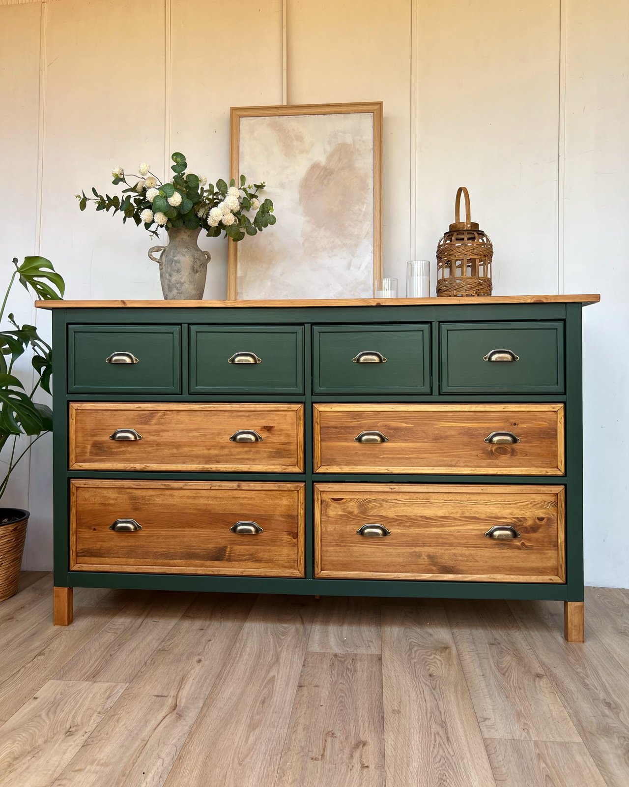 Green-painted HEMNES dresser with wood drawer fronts, brass cup pulls, and warm styling